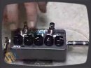This is a roundup of almost all Z Vex pedals (by Mr. Vex himself) taken from the NAMM exhibition at 2006 by gearwire.com. Mr. Vex keeps his usual humour and good mood (I love that!) despite the fatigue of the show... My favourite, of course, is the Wah. Beautiful handcrafted (and handpainted, too!) pedals, but some of them a bit overpriced - even above usual boutique pedals' prices - and a bit small to be used easily on stage (unless you tape it down and use your finger to switch it on/off to avoid stepping on the knobs as well...) To Mr. Vex's immense credit, they are really advanced in terms of electronic design, and not a copy of anything else (a refreshing move in today's world of pedal clones). Described by some snobbish people as 