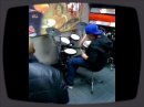 I walked into Best Buy today and noticed they had musical instruments. I caught these dudes on my iphone messing around in the drum room. I